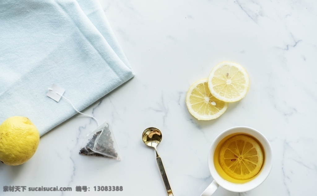 柠檬茶图片 柠檬茶 白色陶瓷杯 茶 柠檬 杯子 茶杯 茶包 生活百科 生活素材