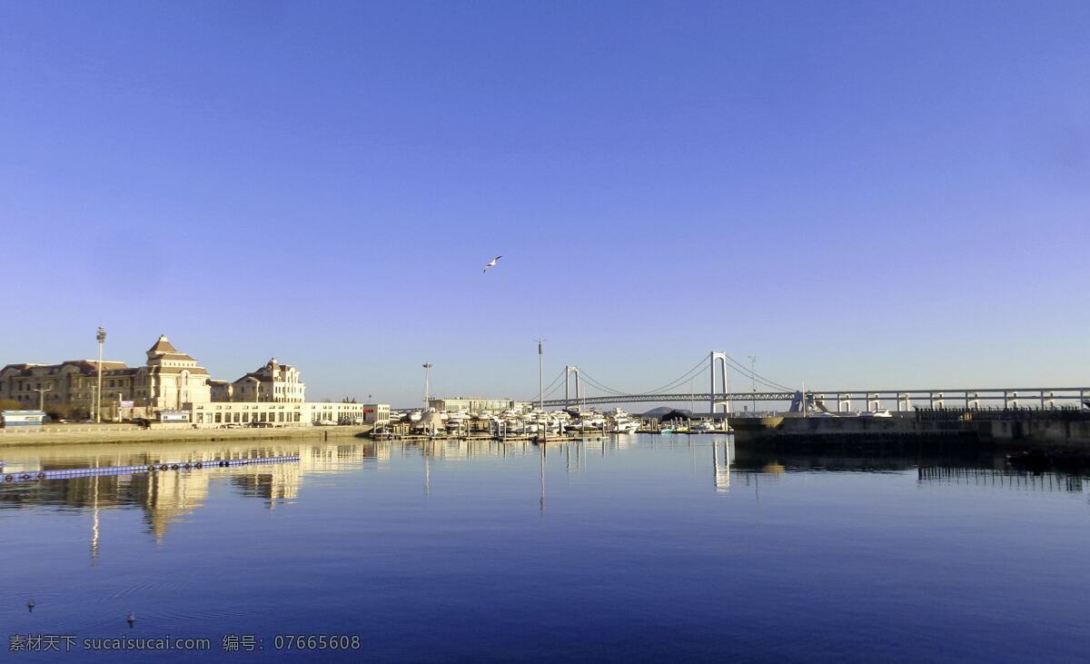 大连 星海湾 夕阳 海滨 风光 天空 蓝天 大海 海水 海岸 建筑 跨海大桥 游船 码头 倒影 海滨风景 大连风景 旅游摄影 国内旅游