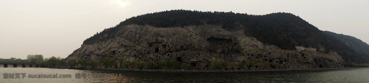 龙门石窟全景 河南 洛阳 龙门石窟 景区 全景 伊河 石崖 洞穴 石刻 雕塑 建筑园林