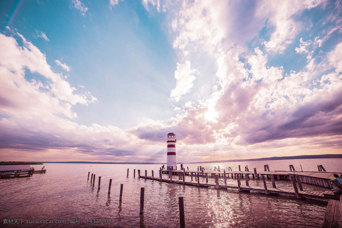 彩色天空 天空 彩色 灯塔 大海 海水 建筑 阳光 云层 蓝天 白云 桥 太阳 自然景观 自然风景